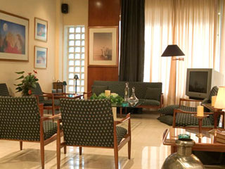Saronicos Hotel TV Room